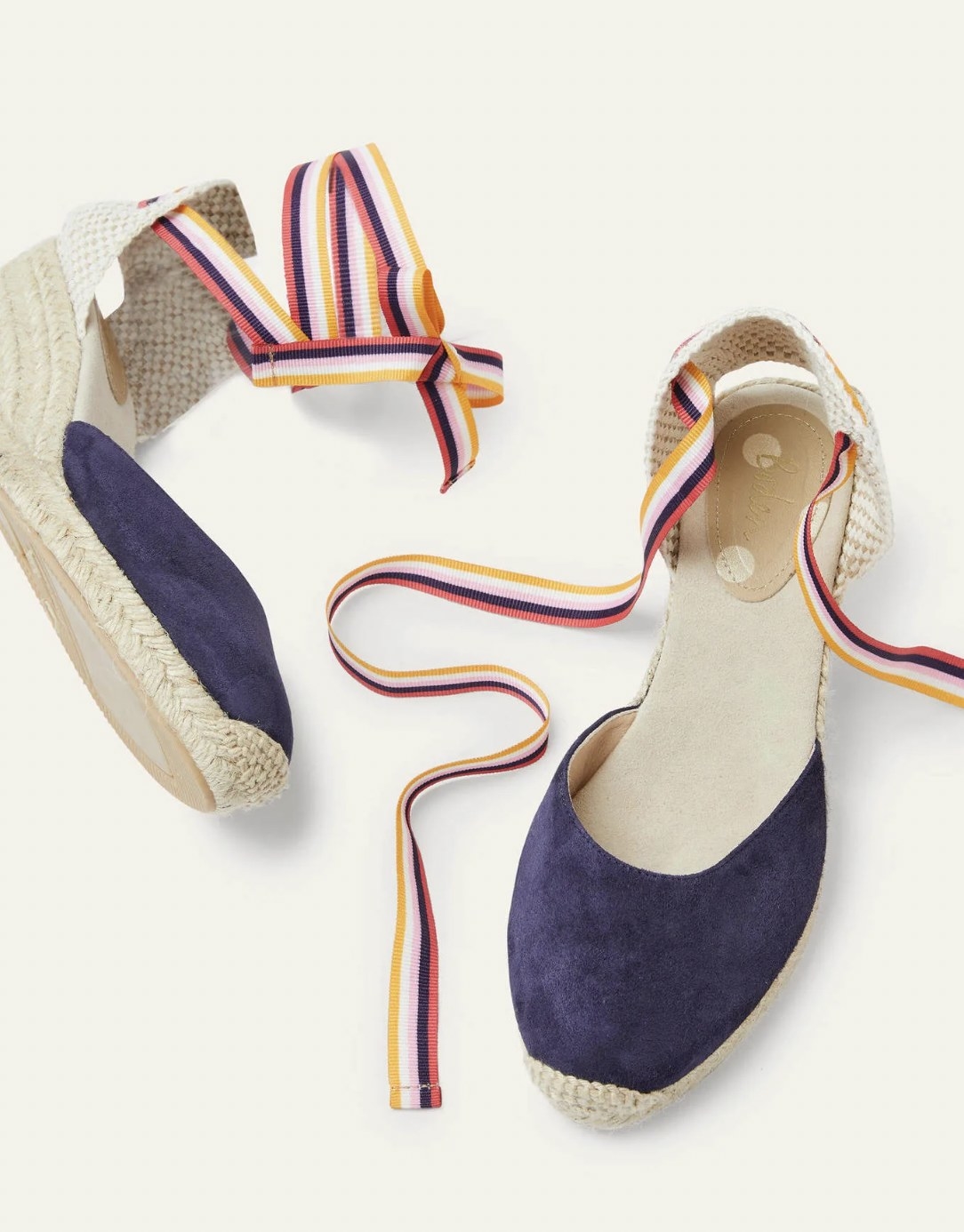 The blue suede sandals with multi-colored ribbon ties