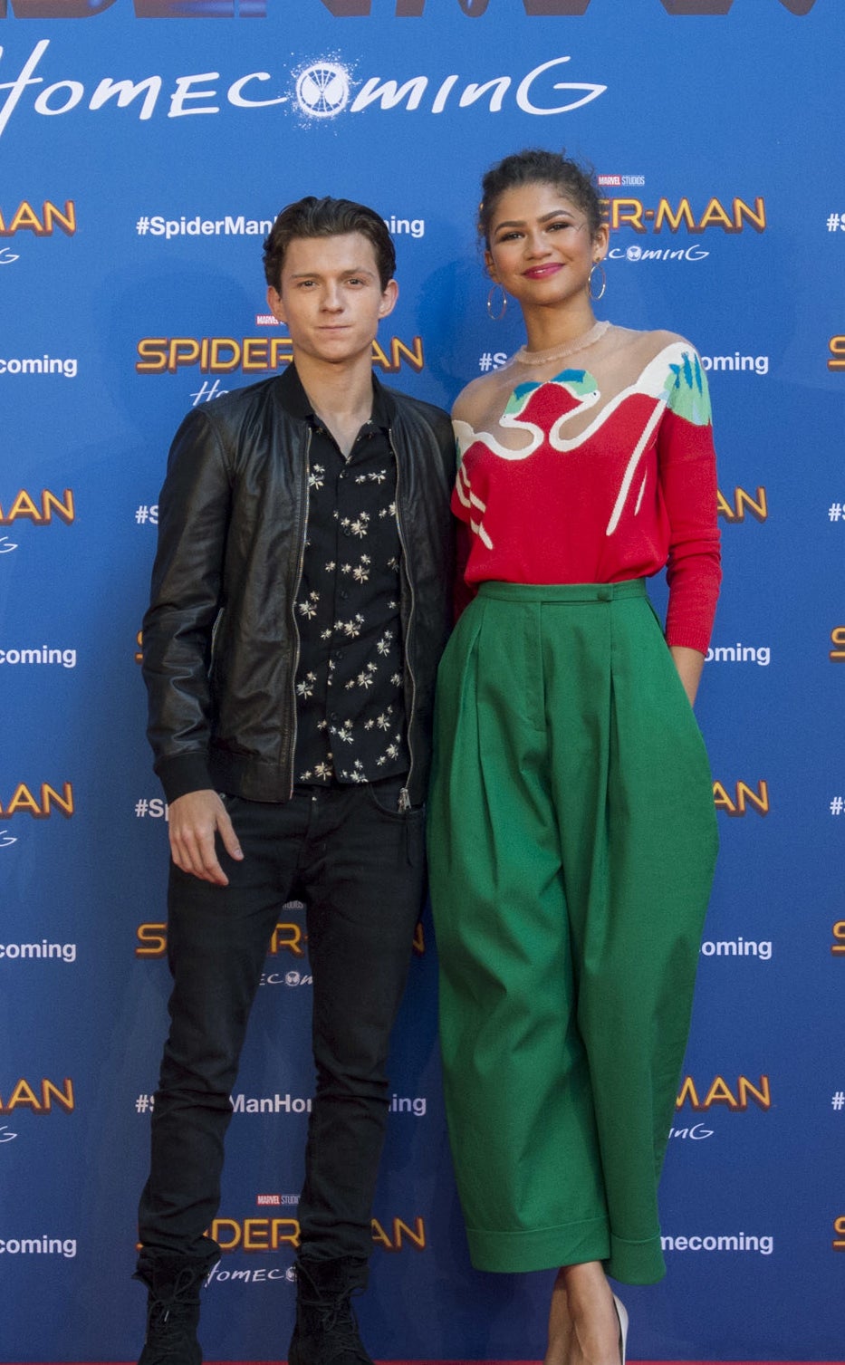 Zendaya and Tom Holland on a red carpet