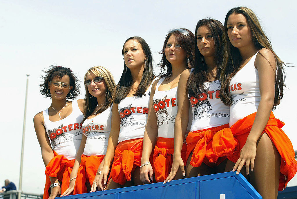 Hooters girls lined up for a photo.