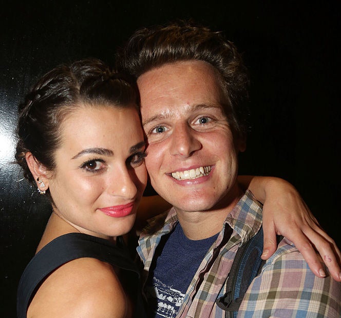 Lea Michele and Jonathan Groff hug and smile