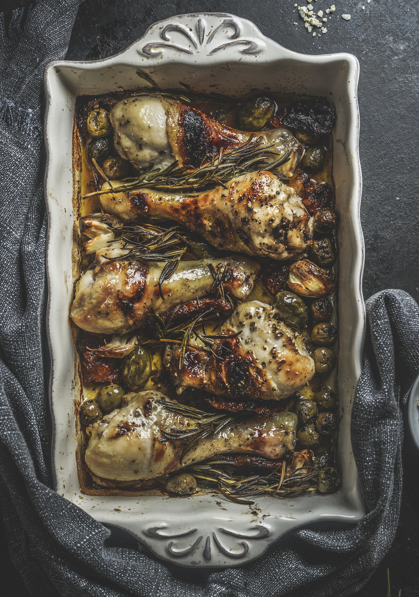 Oven roasted chicken drumsticks with olives and capers