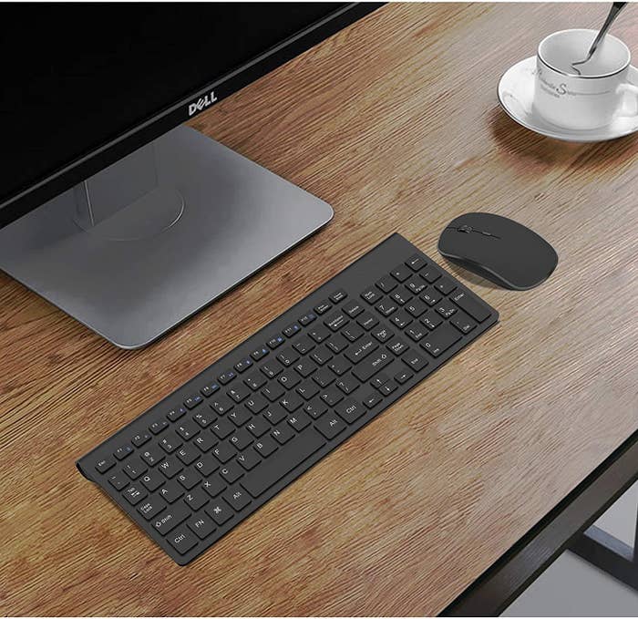 the keyboard and mouse on a desk