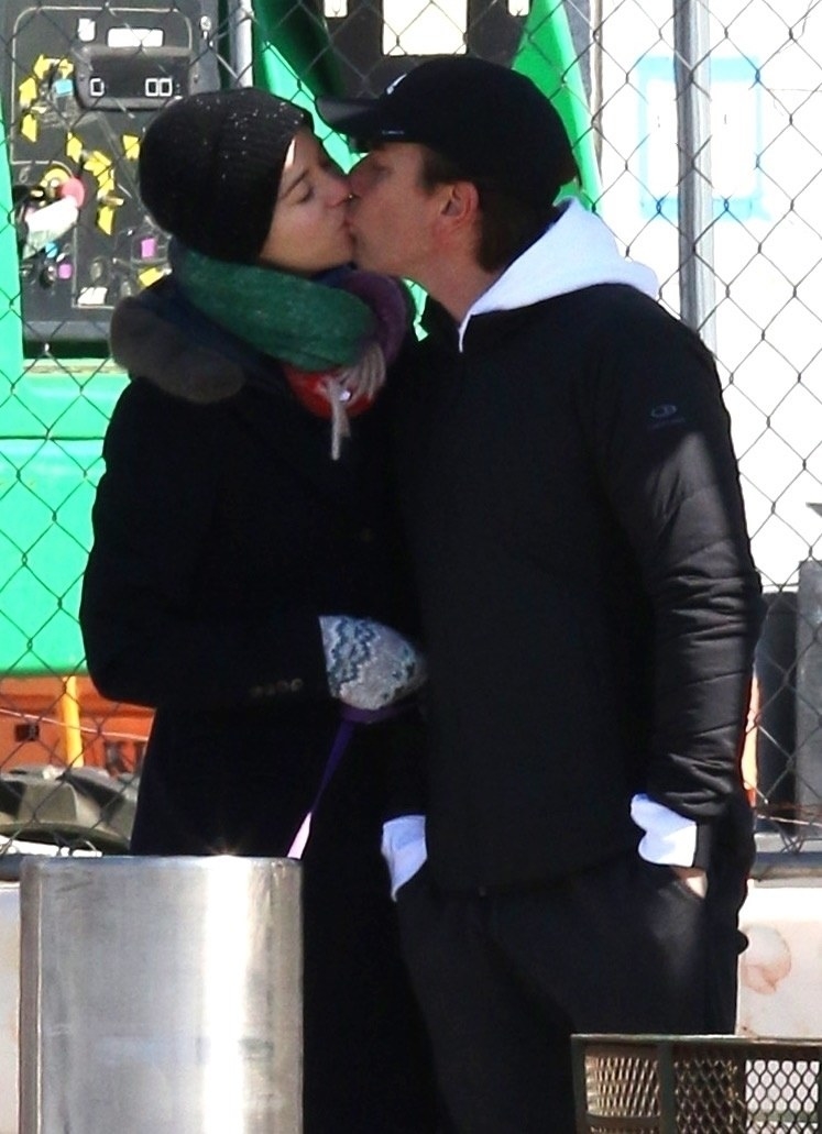 Ewan and Mary kiss outside