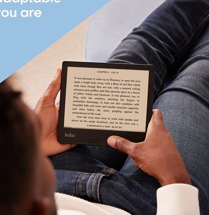 A person sitting reading from the Kobo