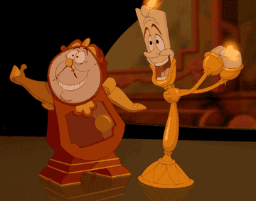 the candle and clock from Beauty and the Beast cheering