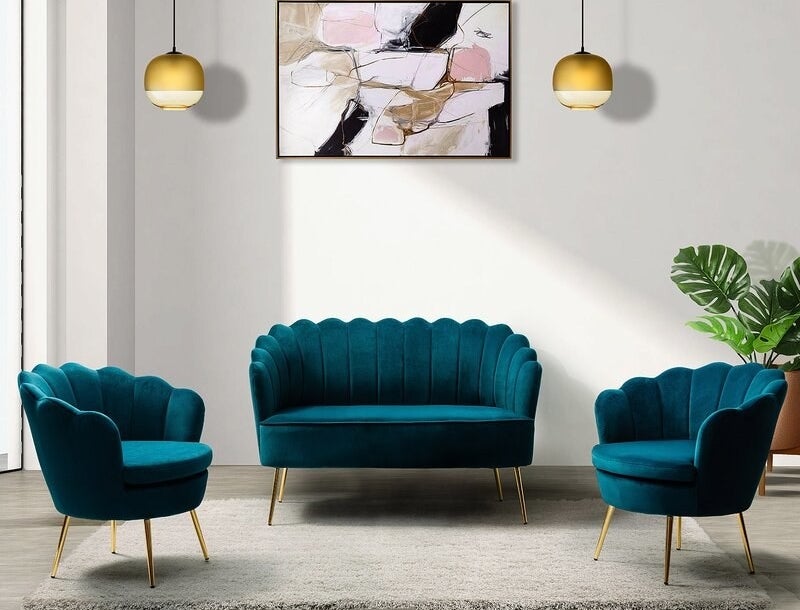the teal loveseat with matching accent chairs