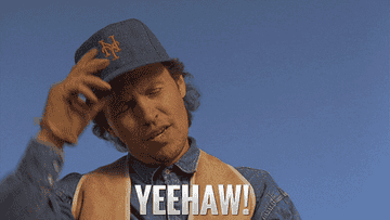 GIF of Billy Crystal in City Slickers saying, &quot;Yeehaw!&quot;