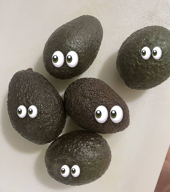 Uncut avocados with googly eyes