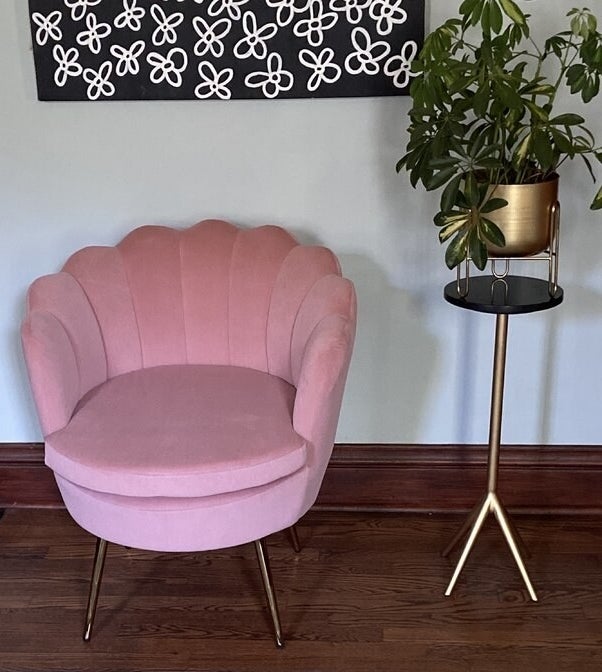a reviewer photo of the chair in pink