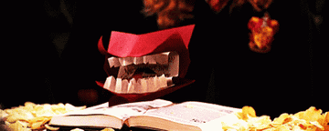 A gif of a red envelope, floating in the air in the shape of a mouth talking
