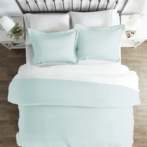 The duvet set on a bed in a bedroom