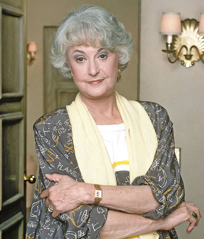 bea arthur standing with arms crossed