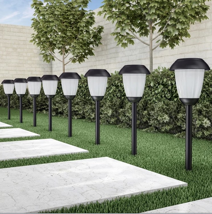 An image of a eight solar-powered pathway lights that provide six hours of cool white light