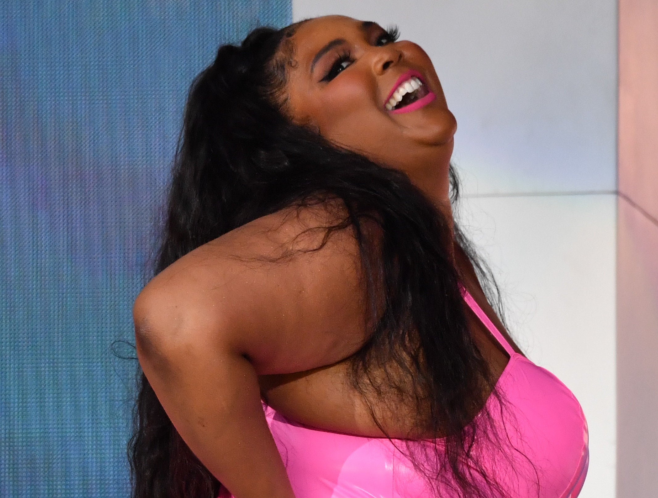 A closeup of Lizzo on stage