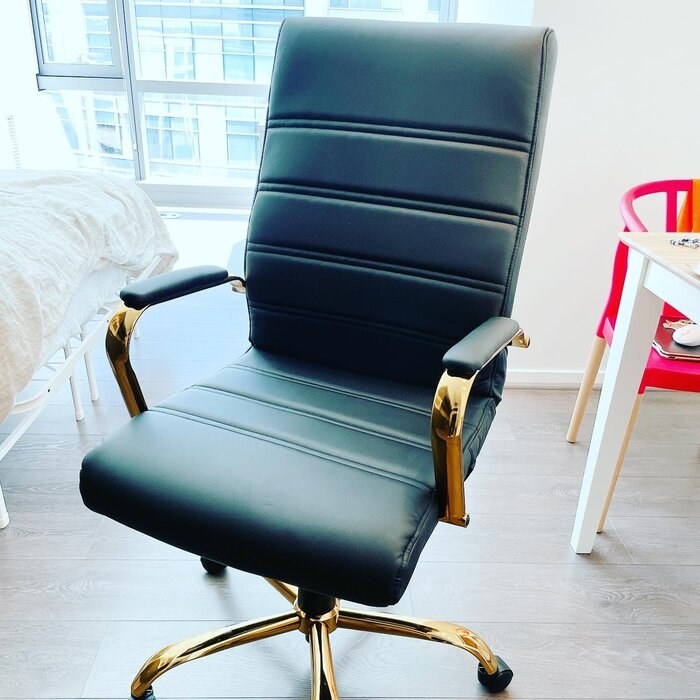 A black/gold office chair