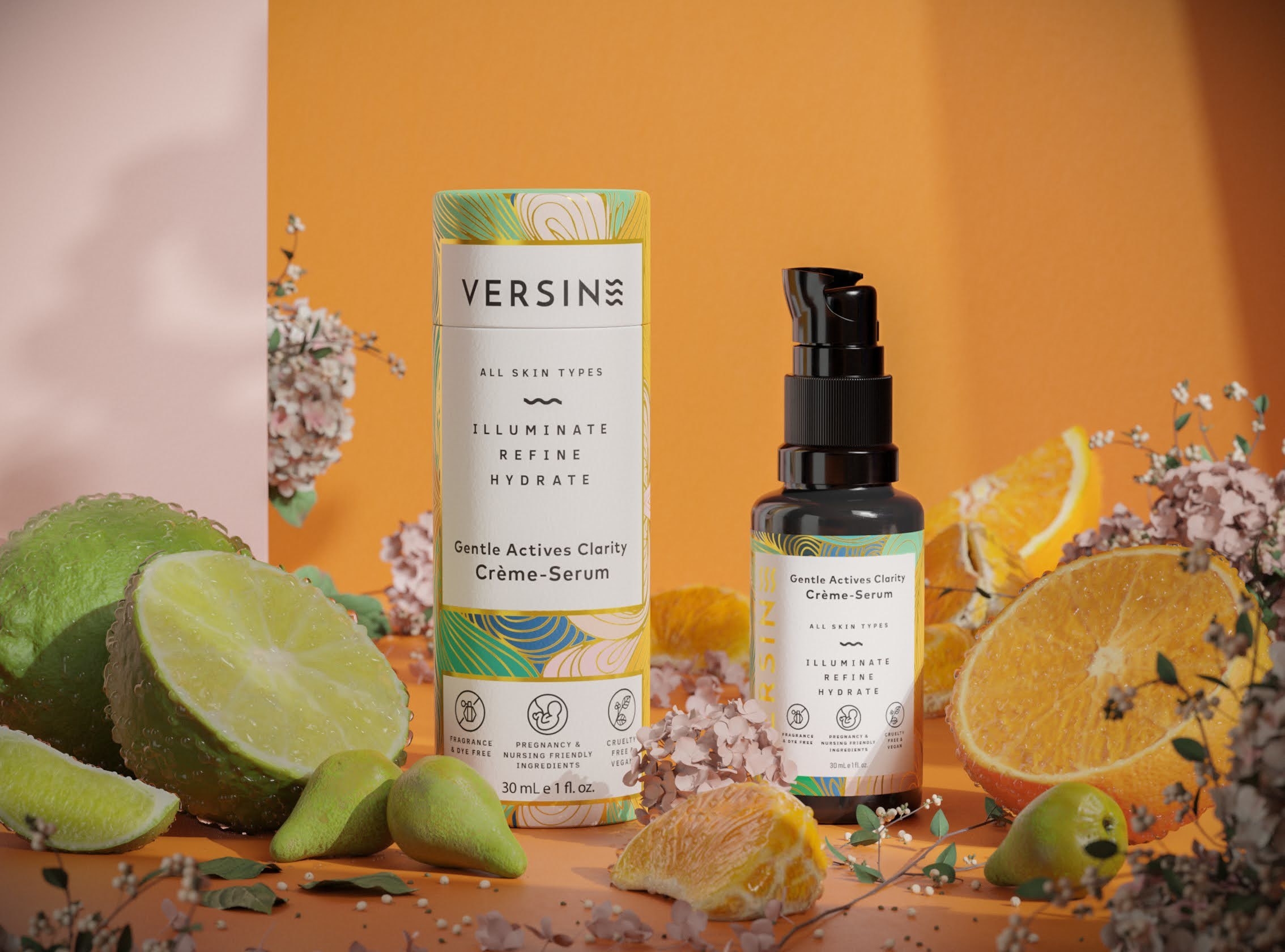 a bottle of the creme serum next to fresh cut citrus fruit