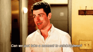 Max Greenfield as Schmidt in &quot;New Girl&quot;, smiling and saying, &quot;Can we just take a moment to celebrate me?&quot;