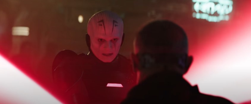 An Inquisitor holds a spinning red lightsaber