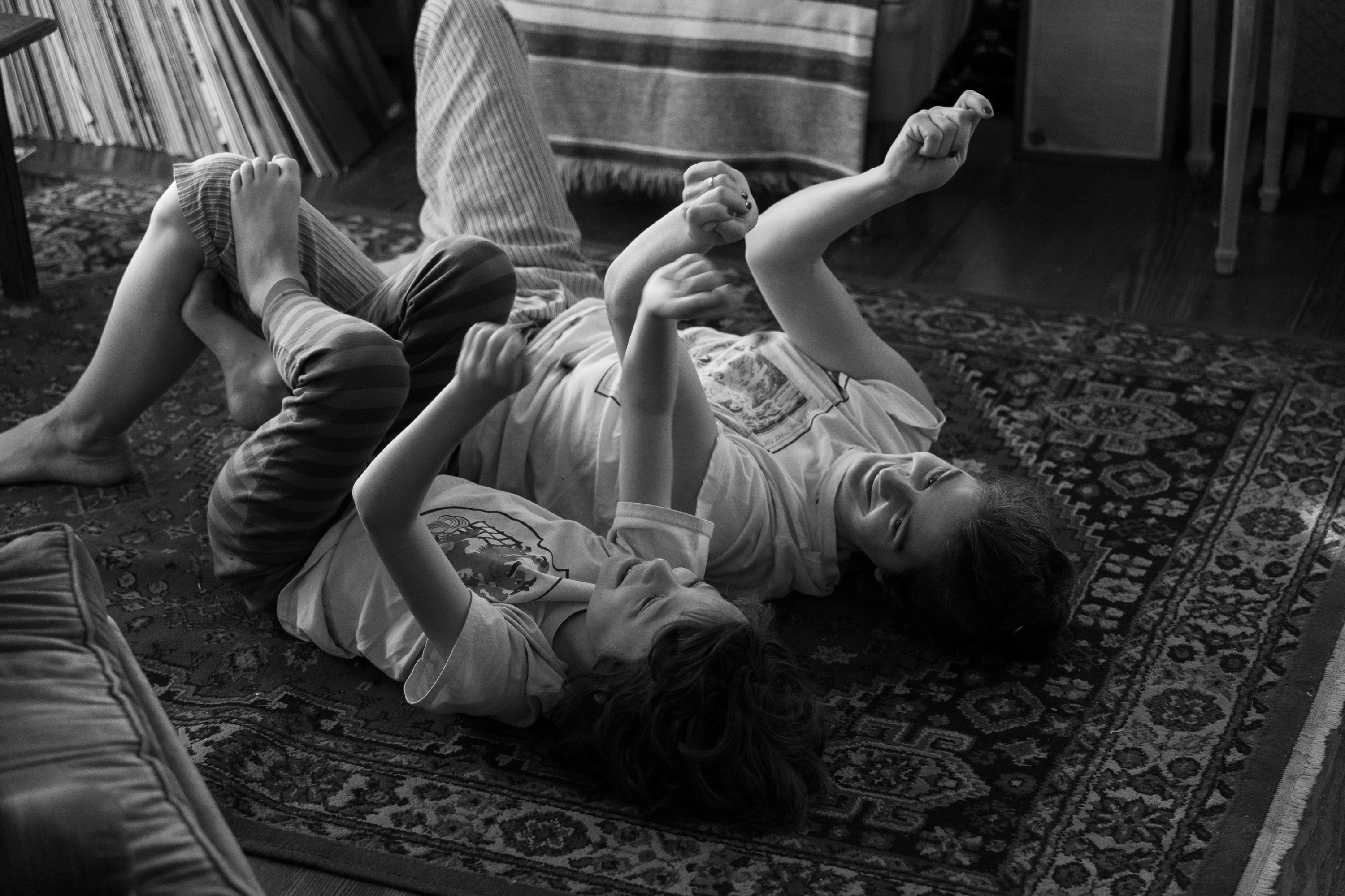 Woody Norman and Gaby Hoffmann lay on the floor