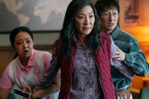 Stephanie Hsu as Joy, Michelle Yeoh as Evelyn, and Ke Huy Quan as Waymond in Everything Everywhere All at Once