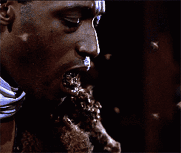 the bees emerging from his mouth