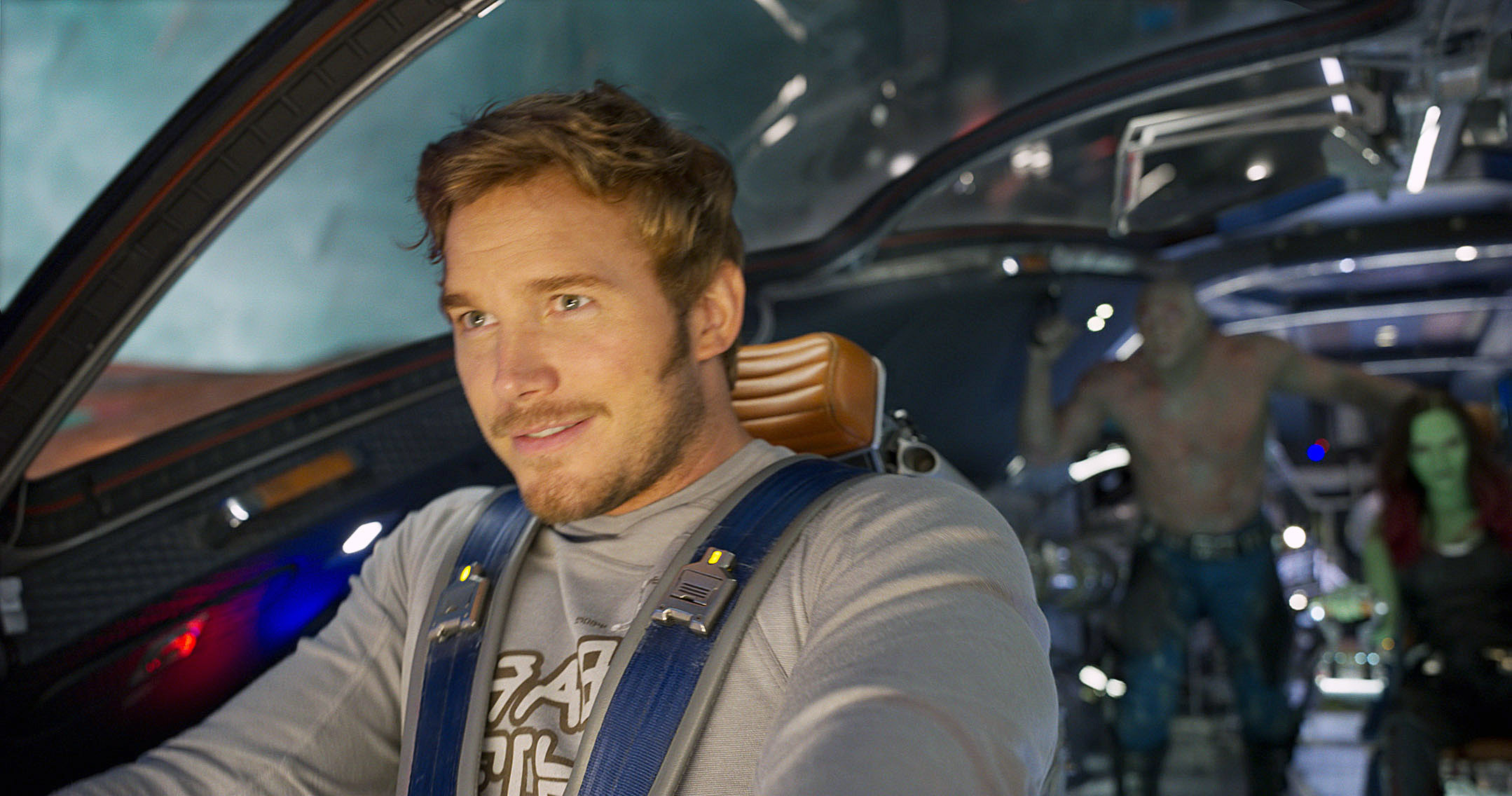 Pratt smiles while flying a spaceship