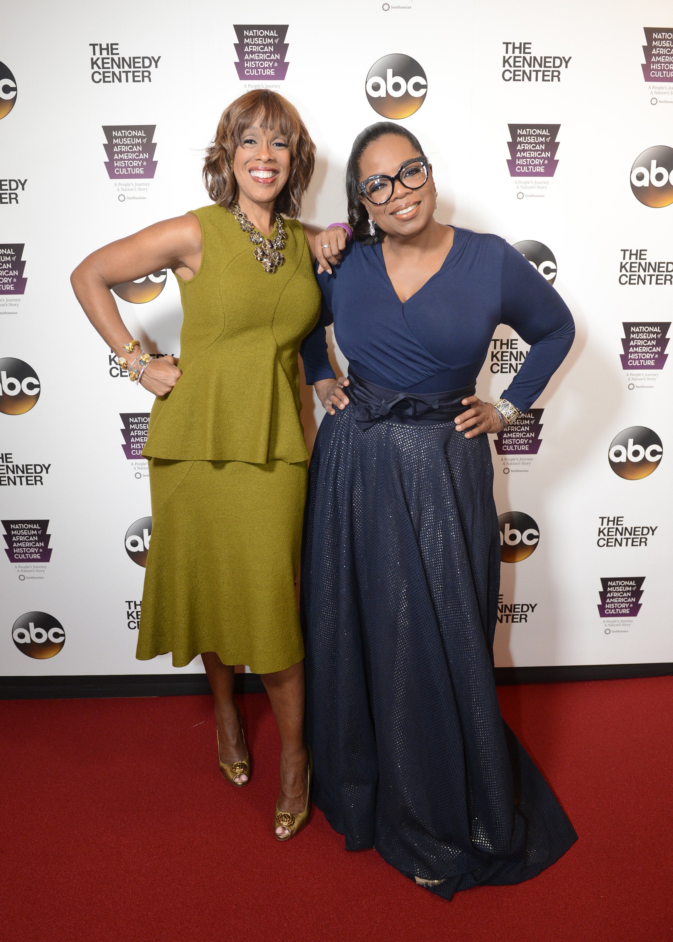 Oprah and Gayle pose for a photo at an event