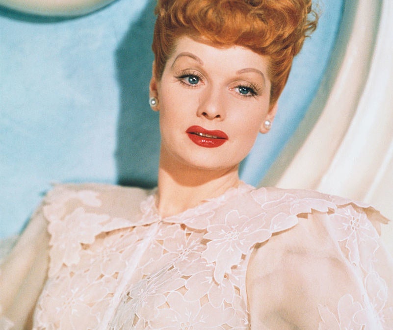 Lucille Ball wearing a lacy dress