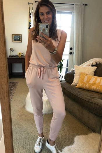 Reviewer wearing the airy pinkish jumpsuit