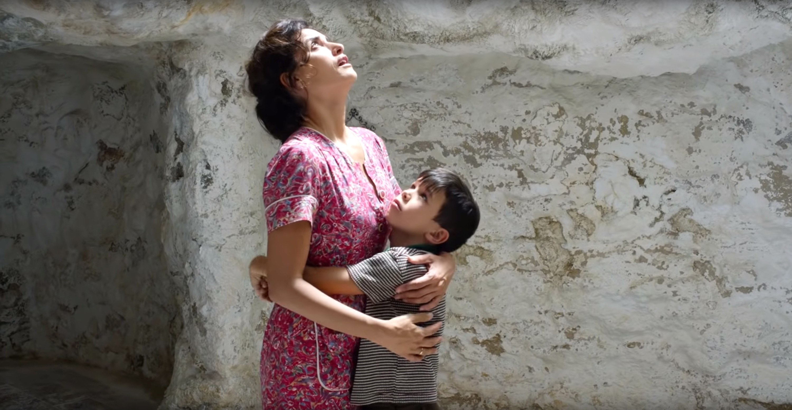 Asier Flores hugs Penelope Cruz