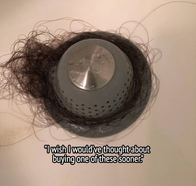 reviewer's drain stopper with hair collected and text 
