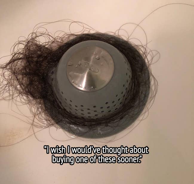 the drain stopper with hair collected and text 