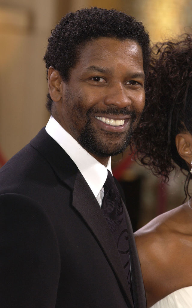 Smiling Denzel with short beard and mustache