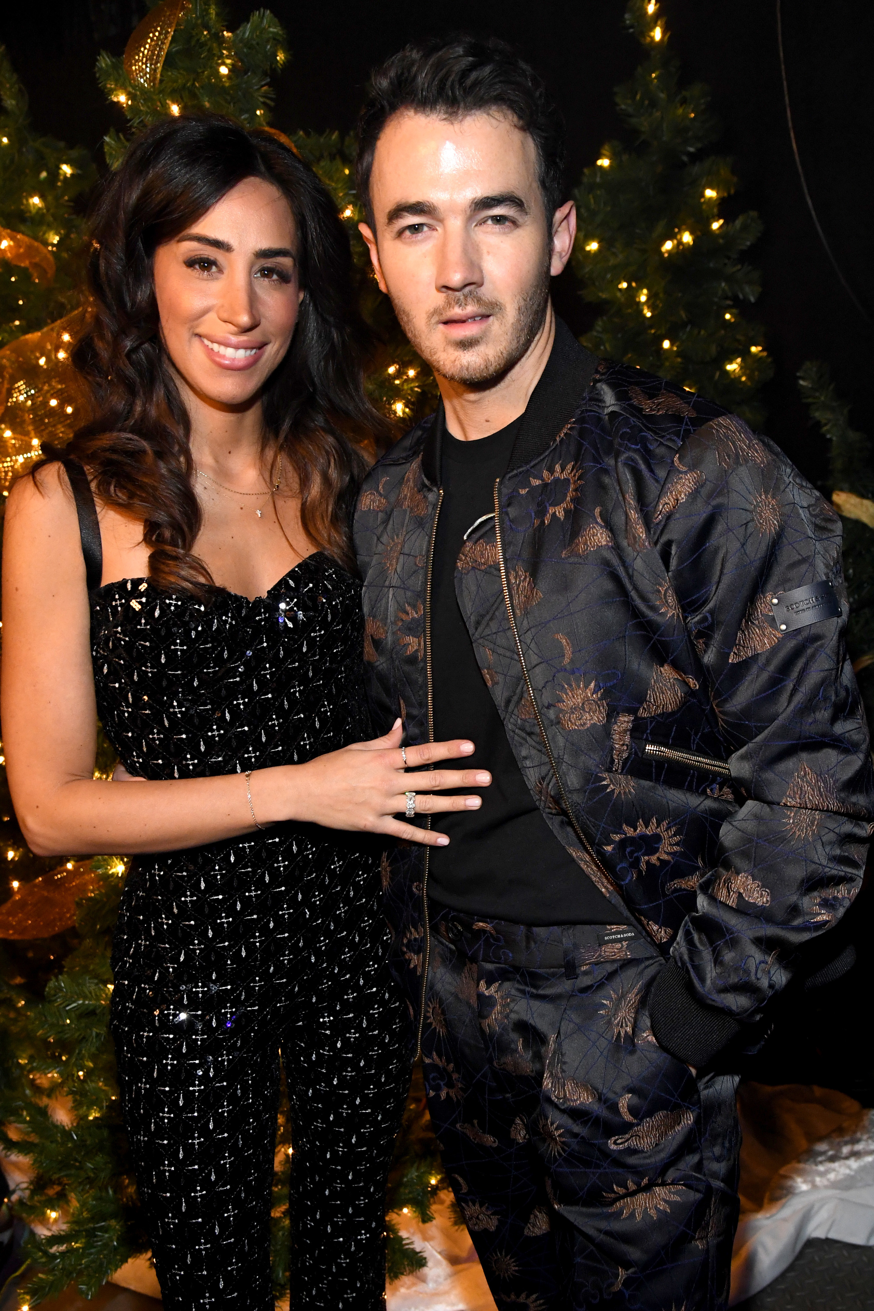 Danielle Jonas and Kevin Jonas attend Jingle Ball 2021