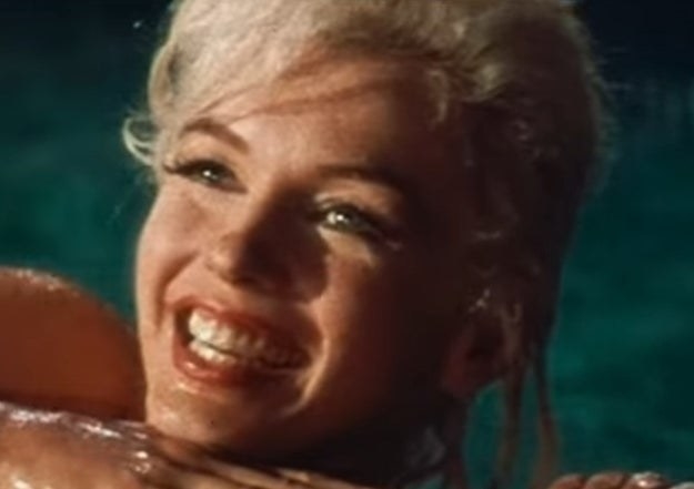 Marilyn smiles in a swimming pool while shooting &quot;Something&#x27;s Got to Give&quot;