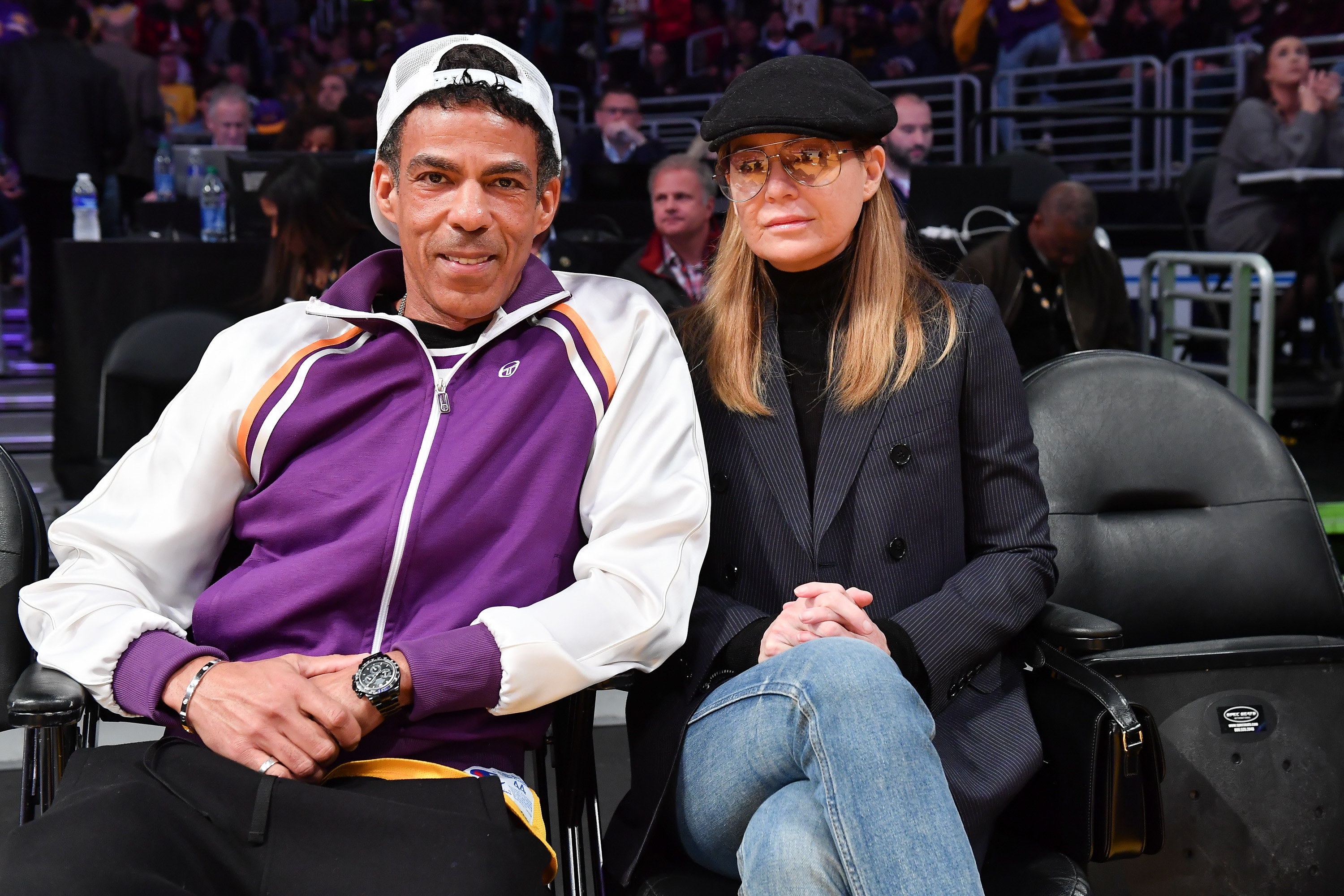 Chris Ivery and Ellen Pompeo attend a basketball game between the Los Angeles Lakers and the Houston Rockets at Staples Center