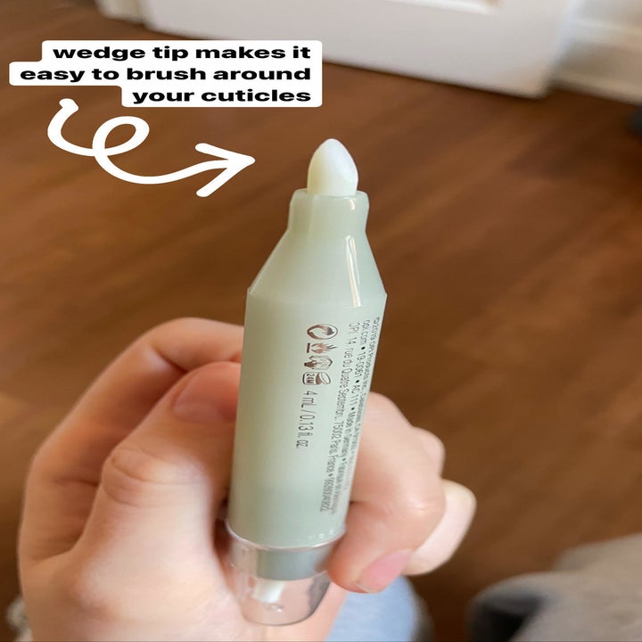 Alice showing the tip of the pen