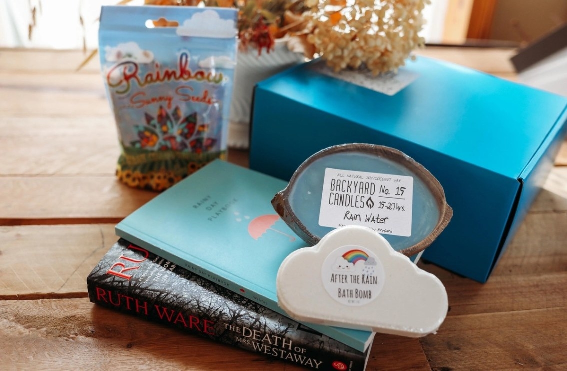 An image of an assortment of items included in the Cratejoy Peace and Pages subscription box