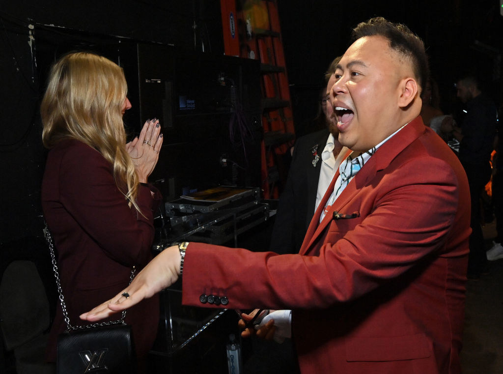 Nico Santos showing his engagement ring at the GLAAD Awards