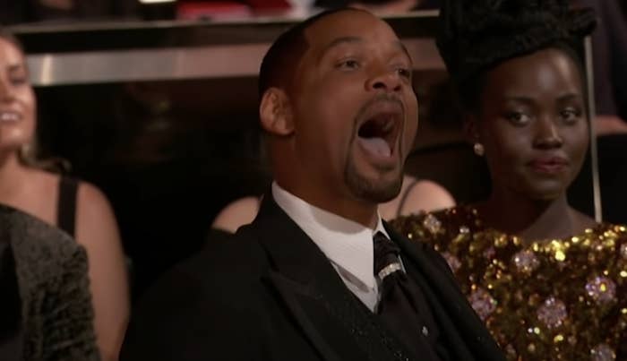 Will Smith yelling at Chris Rock from his seat at the 2022 Oscars