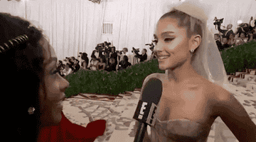 Ariana being interview on the red carpet