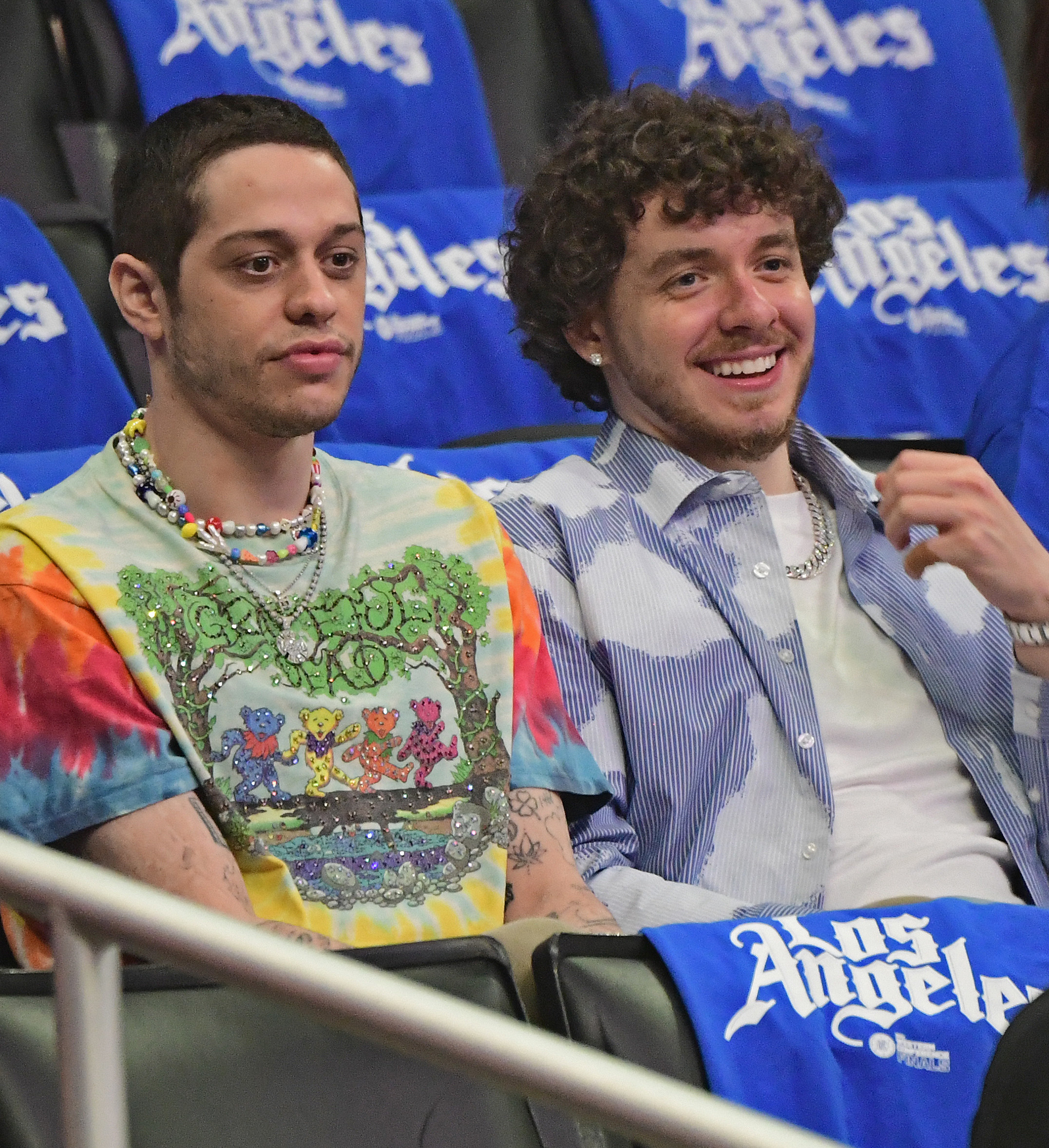 Pete and Jack sitting together at a sports game