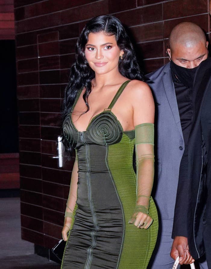 Kylie Jenner in a dress walking out in the street