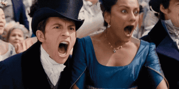 Anthony and Kate cheering vigorously at a horse race in &quot;Bridgerton&quot;