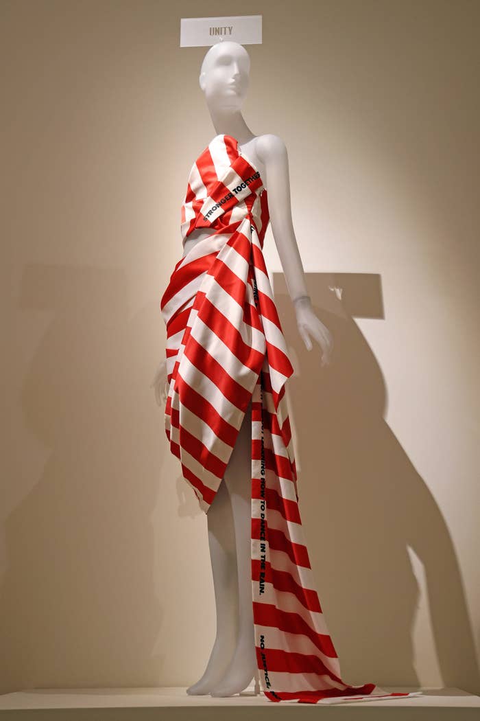 a mannequin wearing a striped flag dress