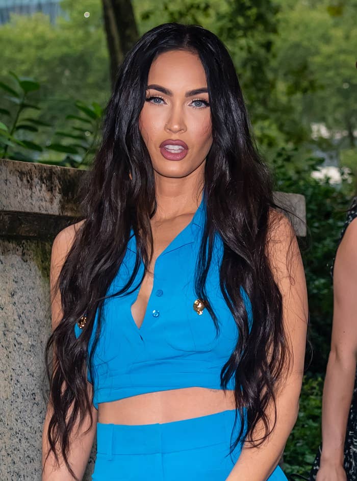 Megan looks at the camera