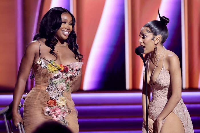 SZA and Doja Cat accepting their Grammy for Best Pop Duo/Group Performance at the 2022 Grammys.