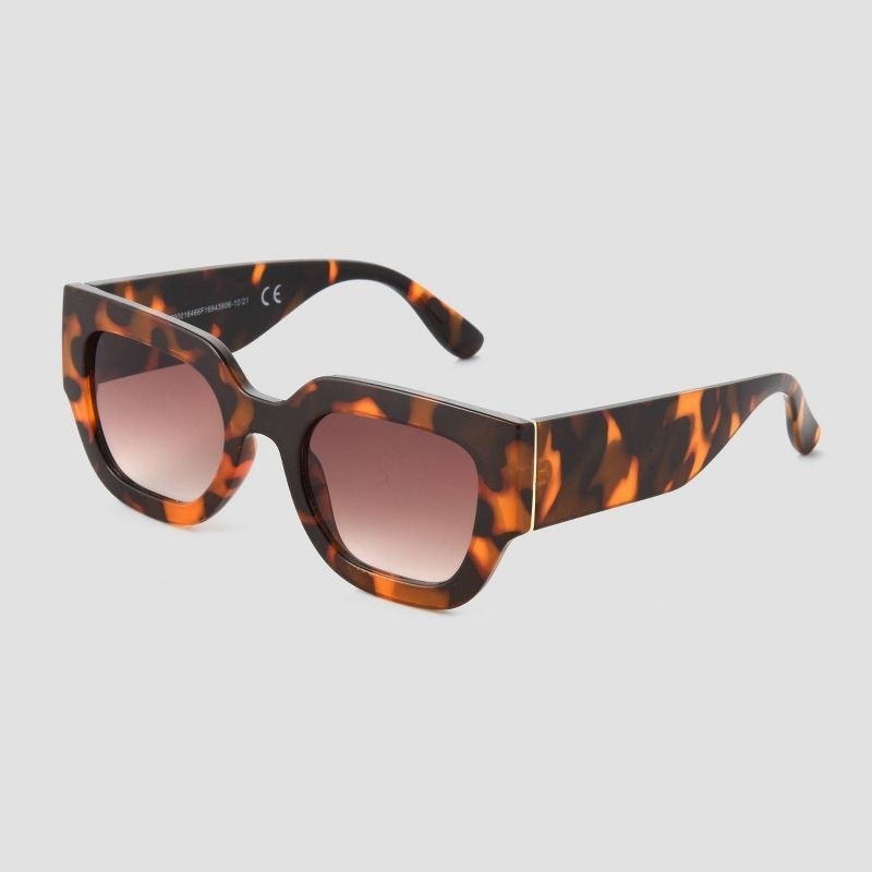 A pair of tortoise shell sunglasses