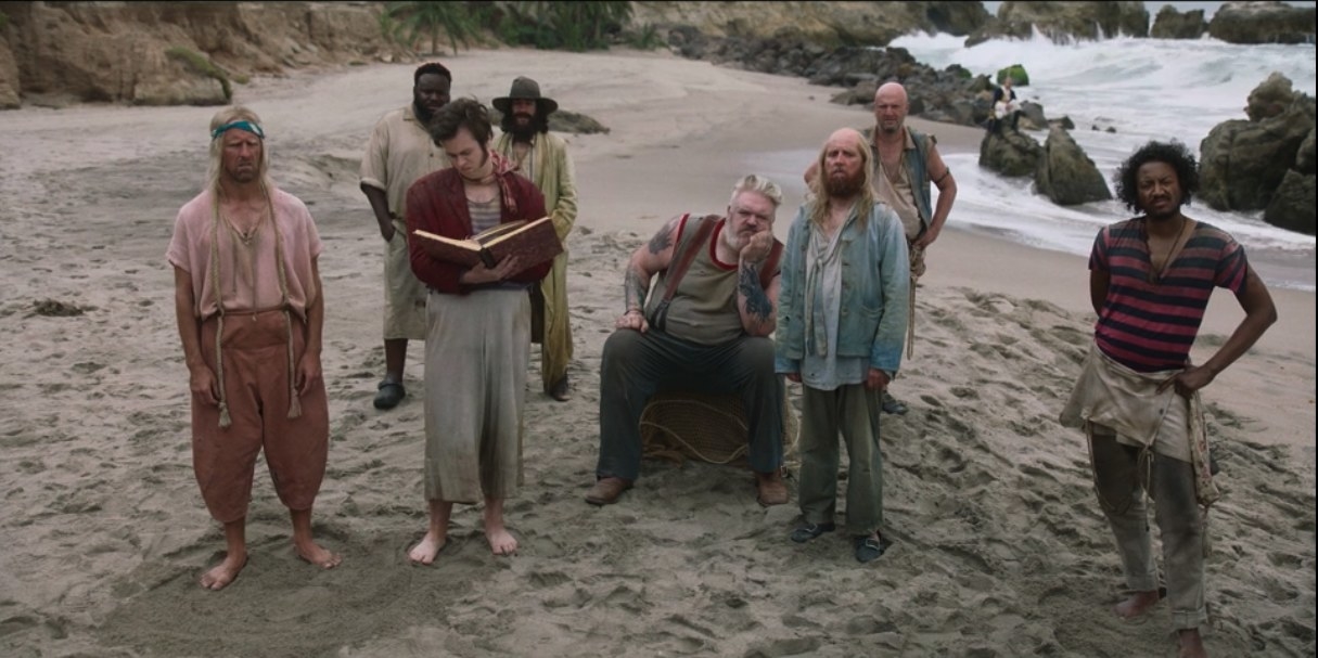 Stede&#x27;s crew stand on the beach, looking at him with confusion.