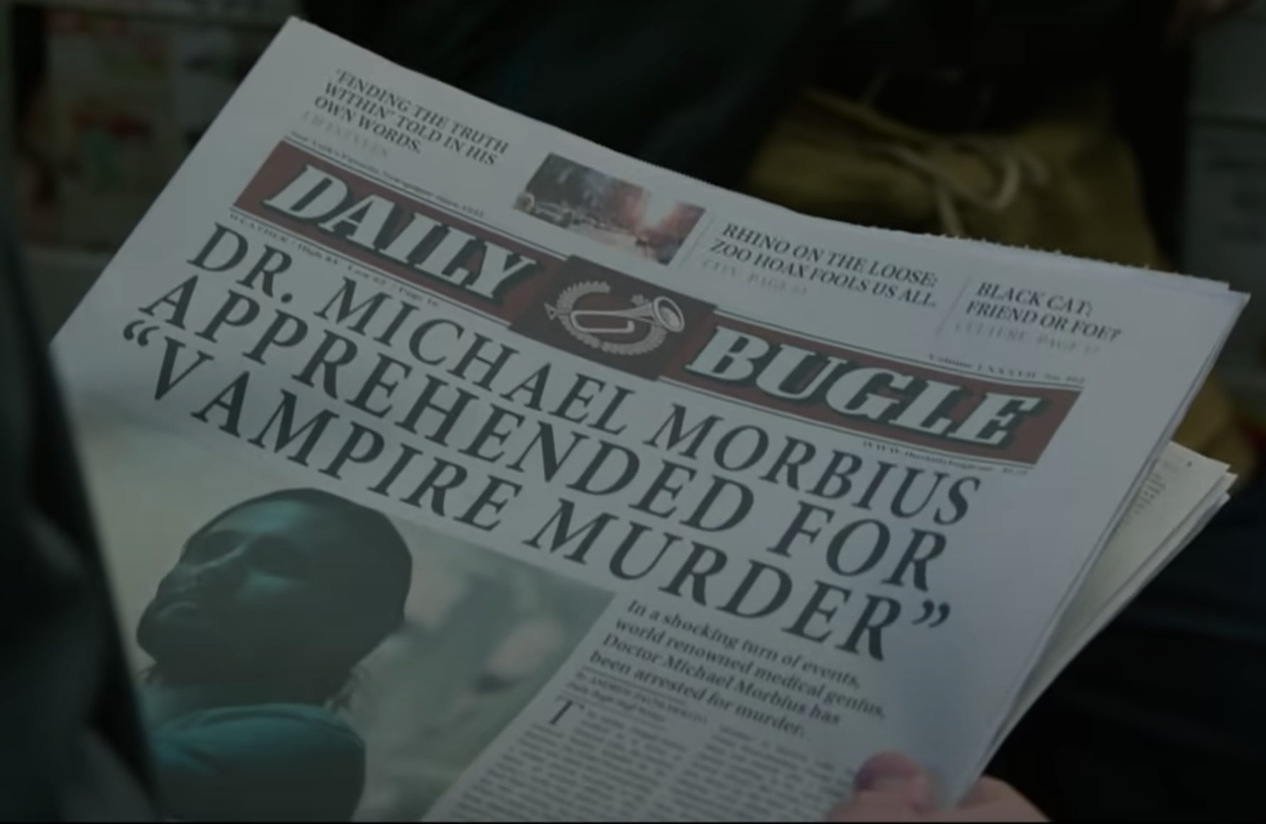 The Daily Bugle newspaper with &#x27;Dr Michael Morbius apprehended for &quot;Vampire Murder&quot; in all caps on the front, with a picture of Morbius on the left under the headline